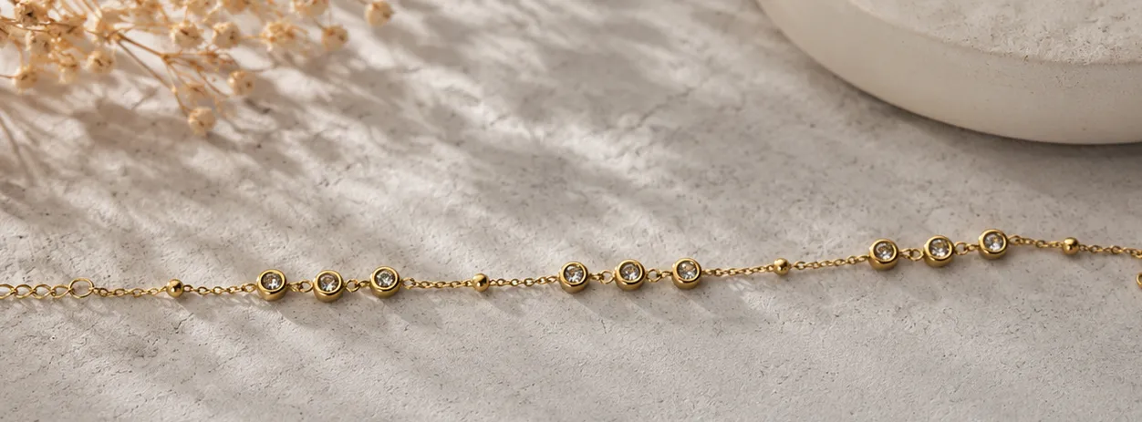 Golden Bezel-Set Station and Bead Bracelet